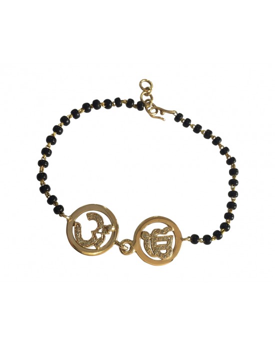 Om & Ik Onkaar joint bracelet in gold on mangal sutra chain Om & Ik Onkaar joint bracelet in gold on mangal sutra chain
