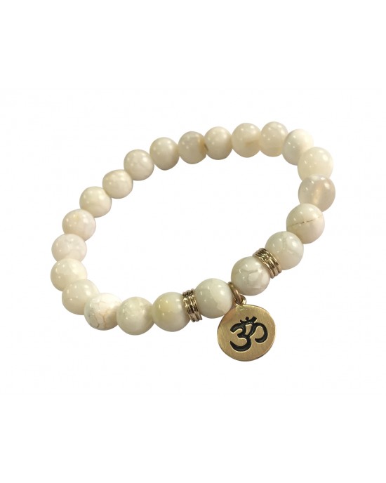 Aumkaara Tranquility Bracelet in gold with White Agate crystal beads Aumkaara Tranquility Bracelet in gold with White Agate crystal beads