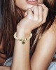 Aumkaara Tranquility Bracelet in gold with White Agate crystal beads Aumkaara Tranquility Bracelet in gold with White Agate crystal beads