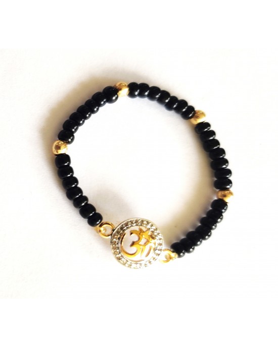 New Born Baby Girl Om Diamond Bracelet with Black Nazaria beads New Born Baby Girl Om Diamond Bracelet with Black Nazaria beads