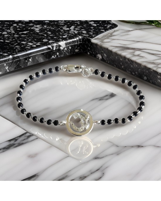 Diamond Om bracelet in silver on mangal sutra chain Diamond Om bracelet in silver on mangal sutra chain