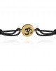 Auspicious Om Bracelet in 14k Gold for New Born Baby on adjustable black thread nazaria Auspicious Om Bracelet in 14k Gold for New Born Baby on adjustable black thread nazaria