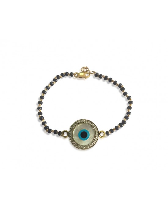 Evil eye bracelet on Mangalsutra chain in gold Evil eye bracelet on Mangalsutra chain in gold